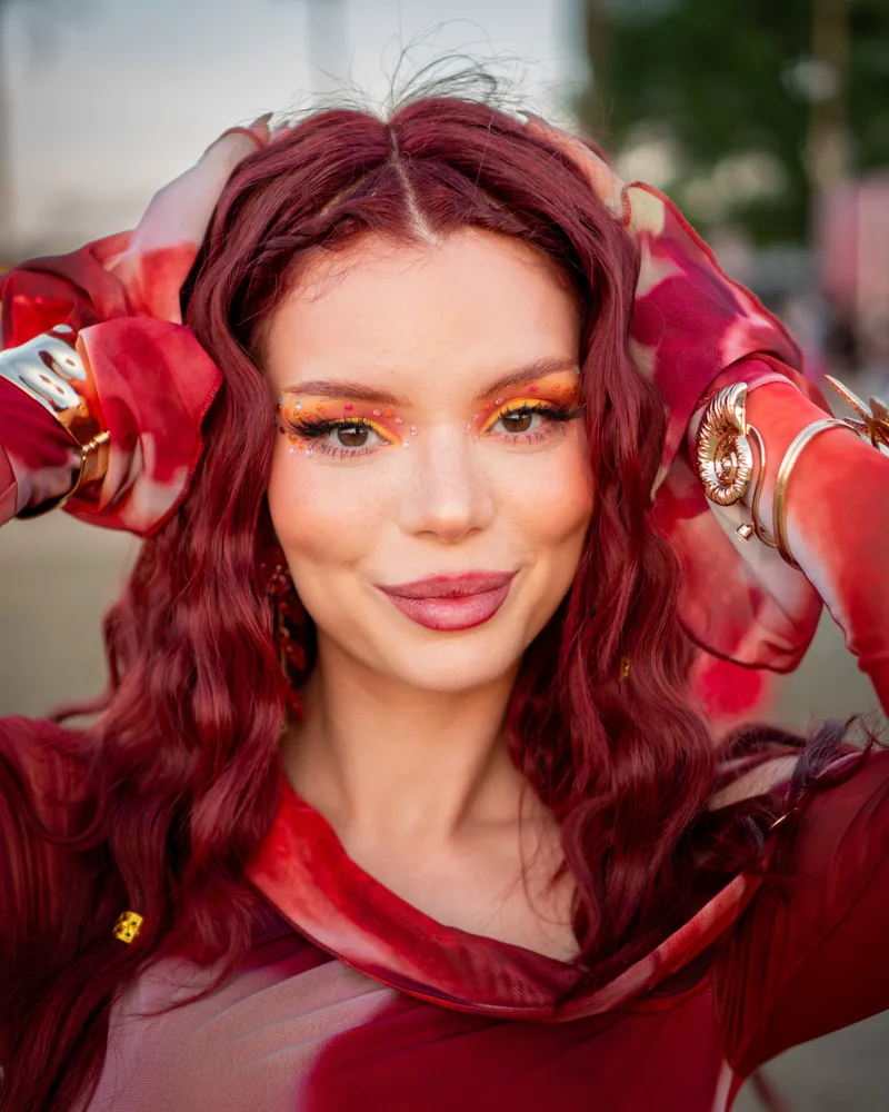 Vivid red-toned editorial portrait